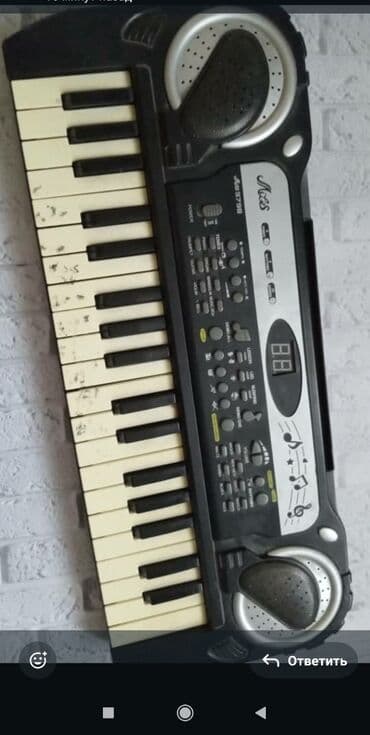 гитара дешевле: Электронный синтезатор черного цвета, модель "Music J-3788", оснащен — 1