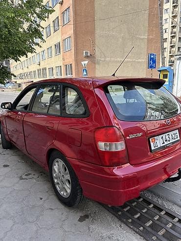 x 5: Mazda 323: 1998 г., 1.5 л, Механика, Бензин, Универсал — 3