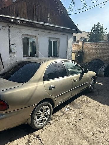 3c te: Mazda 323: 1998 г., 1.6 л, Автомат, Бензин, Седан — 1