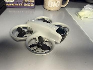 poco x: Квадрокоптер DJI Neo (cinewhoop-формат) с пультом управления DJI — 1