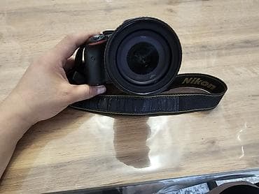 Зеркальная фотокамера Nikon с объективом NIKKOR 18–105mm f/3.5–5.6G ED