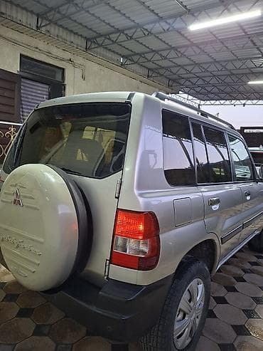 горный: Mitsubishi Pajero iO: 2001 г., 2 л, Автомат, Бензин, Внедорожник — 6