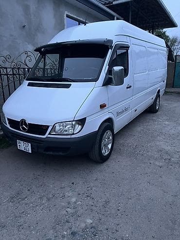 серебряный крест: Mercedes‑Benz Sprinter (длинная база, высокий крыша) — белый фургон — 1