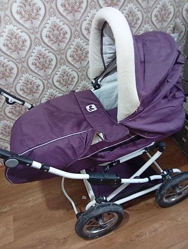 Детская одежда и обувь: Детская коляска-трансформер фиолетового цвета. Особенности: - 2 в 1 — 8