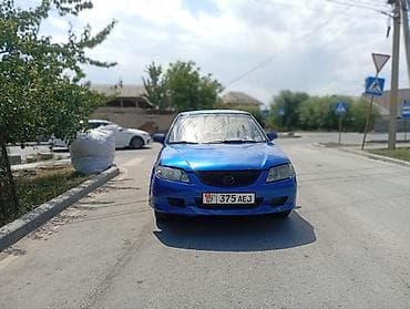 6: Mazda 323: 2001 г., 1.6 л, Механика, Бензин, Хэтчбэк — 2