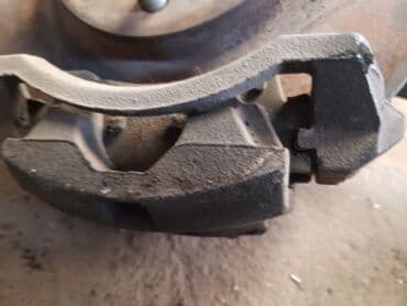 калотка хонда фит: Mazda Familia 323 передний правый суппорт тормоза, Мазда Фамилия — 1