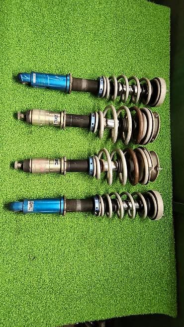 Каловеры стойки амортизаторы в сборе е 60 Комплект 4шт Год 2007 В