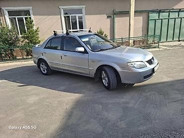 фиат сейченто: Mazda 323: 2003 г., 1.6 л, Механика, Бензин, Седан — 2