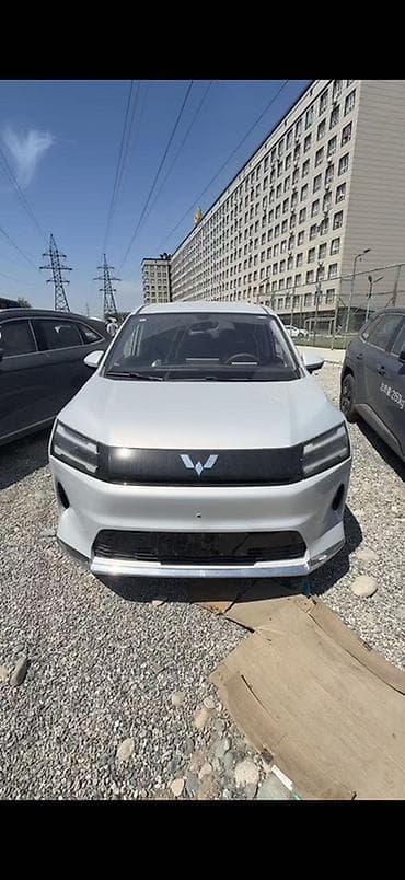 капитан: Wuling Starlight 730 EV。7‑местный семейный MPV. Кузов и дизайн: - — 1