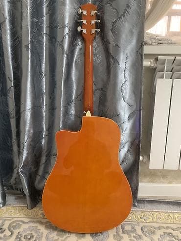 Гитары: Электроакустическая гитара формата дредноут с вырезом. Характеристики — 8