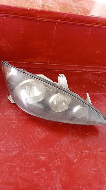 Автокосметика: Передняя левая фара Toyota 2005 г., Б/у, Оригинал, США — 1