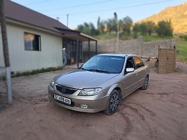 498: Mazda Familia: 2002 г., 1.6 л, Автомат, Бензин, Седан — 1