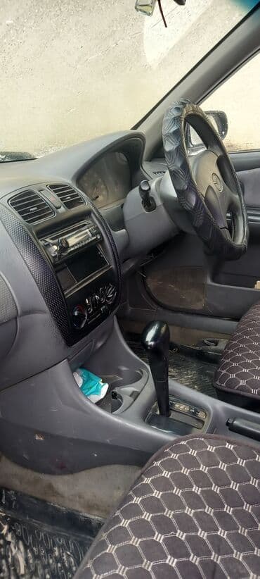 бонго мазда: Mazda Familia: 1999 г., 1.5 л, Автомат, Бензин, Седан — 1