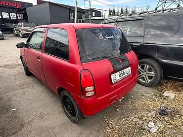 Daihatsu Cuore: 2001 г., 1 л, Механика, Бензин, Хэтчбэк — 4