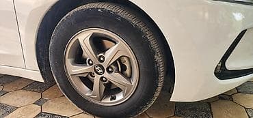 Литые диски Hyundai 15" с шинами R15 - Оригинальные литые диски — 4