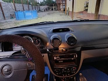 шеврале эпика: Chevrolet Lacetti: 2012 г., 1.6 л, Механика, Бензин, Универсал — 5