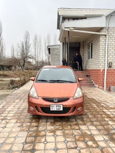 воздушный домкрат для авто: Honda Jazz: 2006 г., 1.3 л, Автомат, Бензиновая, Хэтчбэк — 7