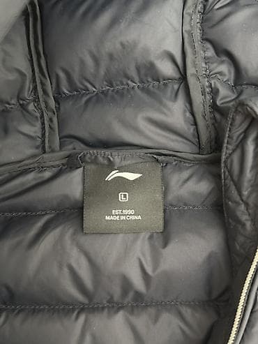 lining kg каталог товаров: Легкая утеплённая куртка-пуховик с капюшоном, черного цвета. Скидки — 2