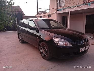 jet ski: Mitsubishi Lancer: 2004 г., 1.6 л, Механика, Бензин, Универсал — 1