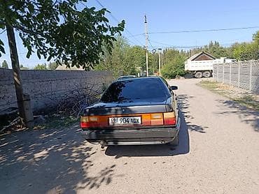 тирактор 80: Audi 100: 1986 г., Седан — 3