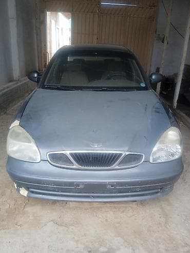 глушитель на бмв е34: Daewoo Nubira: 2001 г., Седан — 4