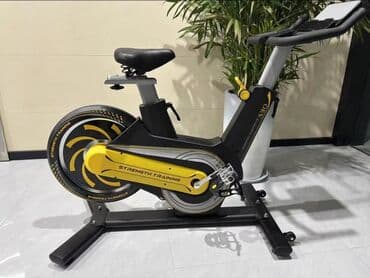 спидометр для велосипеда: Эргономичный велотренажер в черно-желтом дизайне, предназначенный для — 1