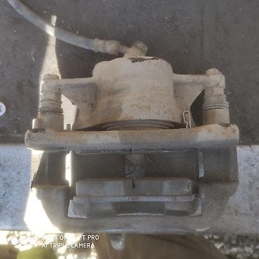 Передний правый суппорт Toyota 1998 г., Б/у, Оригинал, Япония