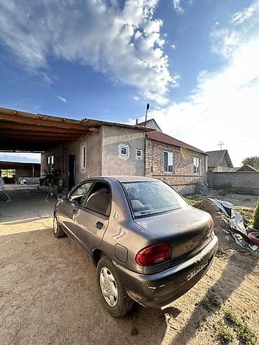 Унаа: Daewoo Nexia: 1991 г., 1.4 л, Кол менен иштөөчү, Бензин, Седан — 4