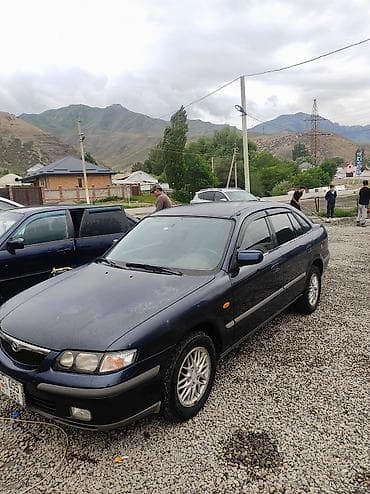 панель 211: Mazda 626: 1999 г., 2 л, Механика, Бензин, Седан — 2