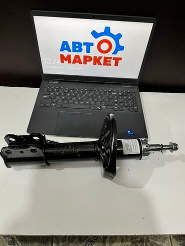 sxm10: Передний амортизатор Toyota 2001 г., Новый — 1