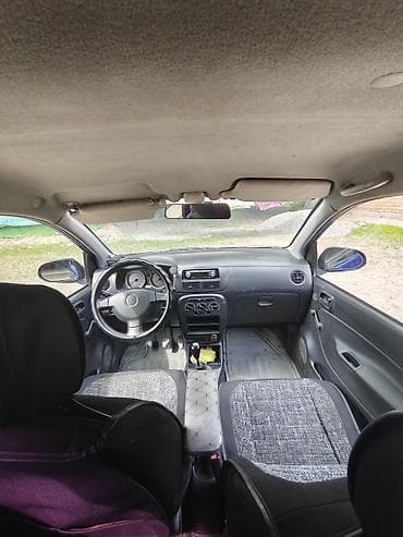 матиз на выкуп: Daihatsu Cuore: 2003 г., 1 л, Ручные, Бензин, Хэтчбэк — 5