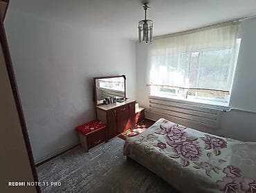 туз село: Большой дом по ул. Тельмана (Карасаева, 30). - Планировка: 4 комнаты — 2