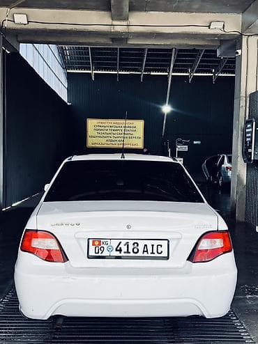 3 7v: Daewoo Nexia: 2009 г., Седан — 4