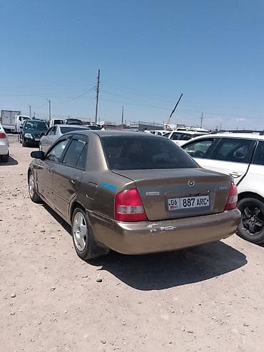 hyundai ionic: Mazda Familia: 1999 г., Автомат, Седан — 3