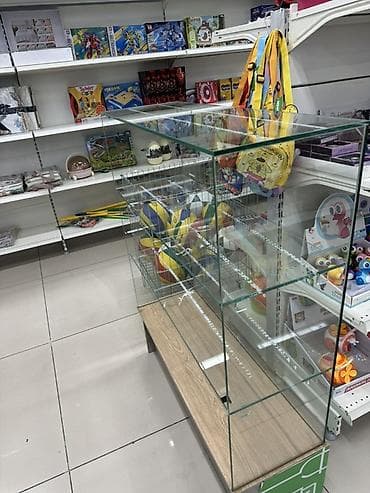 Стеклянная витрина прикассовая/островная для магазина. - Конструкция