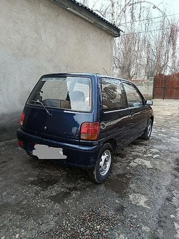 Транспорт: Daihatsu Cuore: 1992 г., 0.8 л, Механика, Бензин, Хэтчбэк — 4