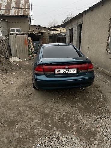 кулиса на 210: Mazda 626: 1992 г., 2 л, Механика, Бензин, Хэтчбэк — 1