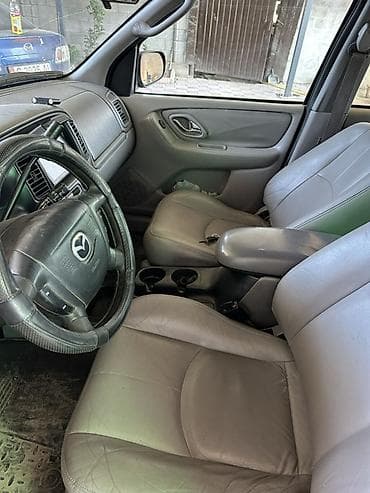 рассматриваю варианты: Mazda Tribute: 2002 г., 3 л, Автомат, Бензин, Кроссовер — 8