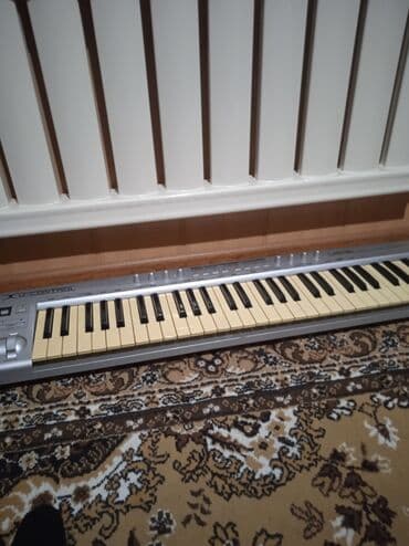 кызыл бирдик: MIDI-клавиатура Behringer UMX61 (U-Control) - 61 полноразмерная — 4