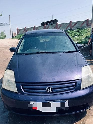 коричневый салон: Honda Stream: 2001 г., 2 л, Автомат, Бензин, Минивэн — 1