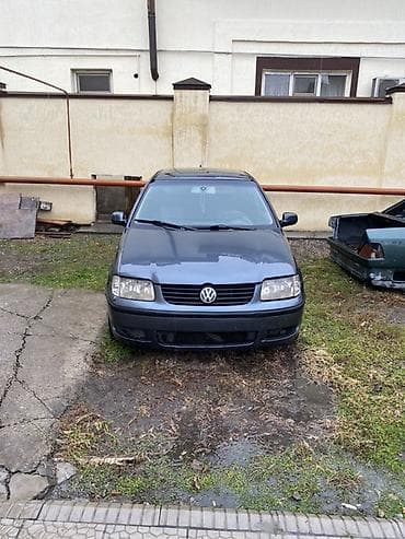 Volkswagen Polo: 1999 г., 1.4 л, Бензин, Седан