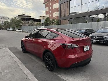 byd e2 2023: Tesla Model Y: 2020 г. — 4