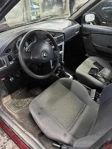 e500 124: Daewoo Nexia: 2011 г., Седан — 6