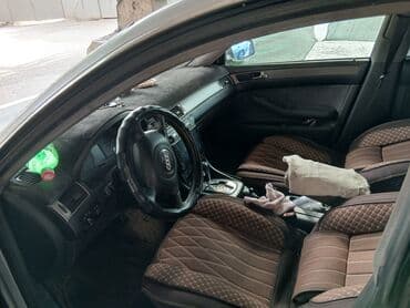 домкрат на ауди: Автомобиль Audi A6 серебристого цвета, представленный в кузове седан — 3