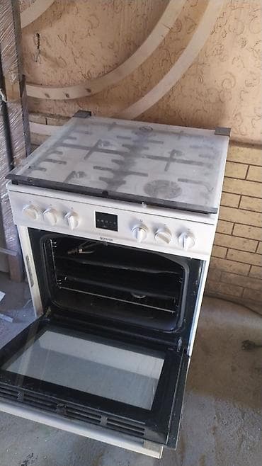 Газовая плита Gorenje с электродуховкой и электронным таймером at lalafo.kg Газовая плита Gorenje с электродуховкой и электронным таймером