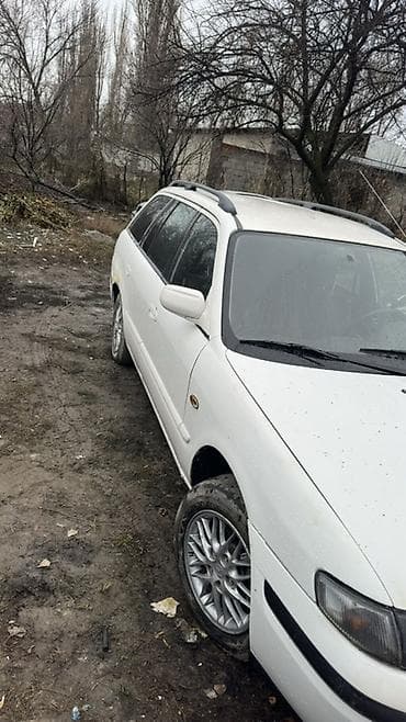 ас машина: Mazda Familia: 1999 г., 1.8 л, Механика, Бензин, Универсал — 2