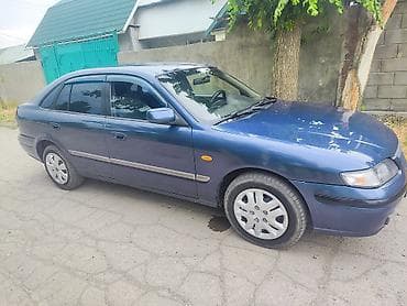 e star: Mazda 626: 1998 г., 1.8 л, Механика, Бензин, Седан — 4