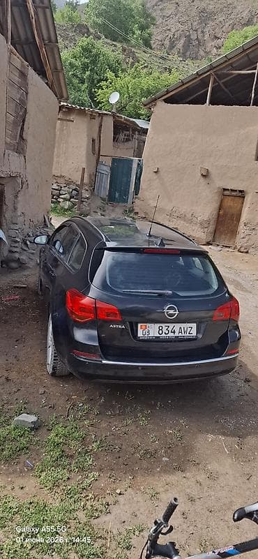 опель ош: Opel Astra: 2014 г., 1.6 л, Автомат, Бензин, Универсал — 5