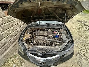 бир: Mazda 3: 2005 г., 1.6 л, Кол менен иштөөчү, Бензин, Седан — 7