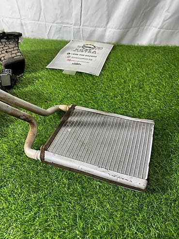 Унаа тетиктери: Радиатор печки Hyundai Tucson TL (3 поколение), год выпуска — 1